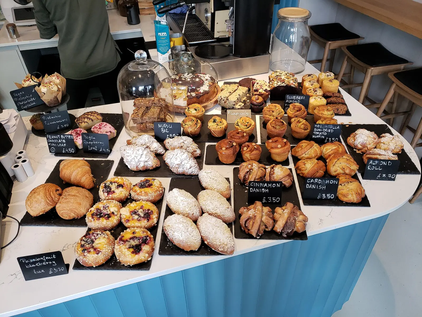 Breads and pastries on a bakery counter. The photo was not taken at an East Cobb bakery.