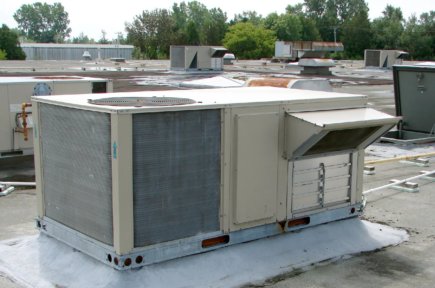 Rooftop heating and air-conditioning units on a flat commercial roof. The picture does not show Dodgen Middle School.