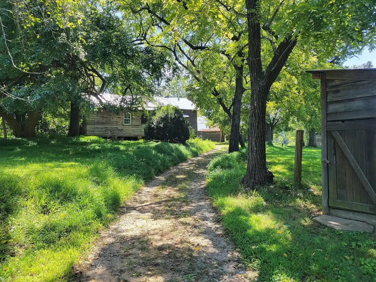 A path past the old farm buildings at Hyde Farm Park in East Cobb