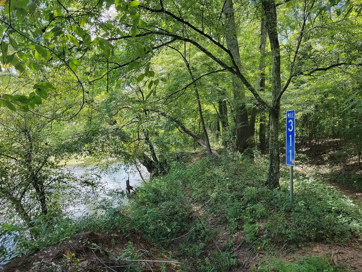A river mile marker beside the Chattahoochee River in the Johnson Ferry North unit