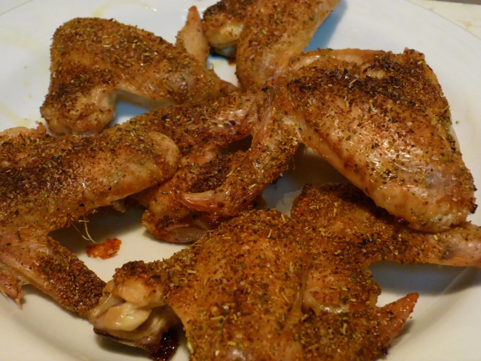 A plate of seasoned chicken wings. The photo was not taken at an East Cobb restaurant.